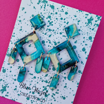 INTO THE BLUE DANGLES